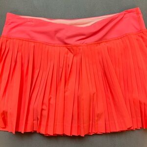 Lululemon accordion style skirt. Size 8. Like new. pretty peach color.